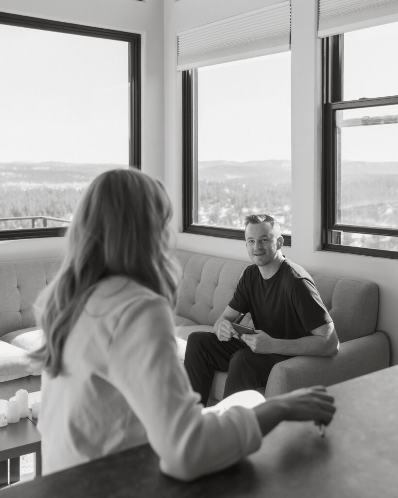 Bride and groom talking in their Airbnb
