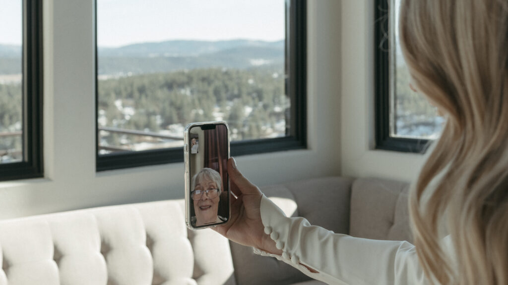 Bride calling her grandmother before the elopement 