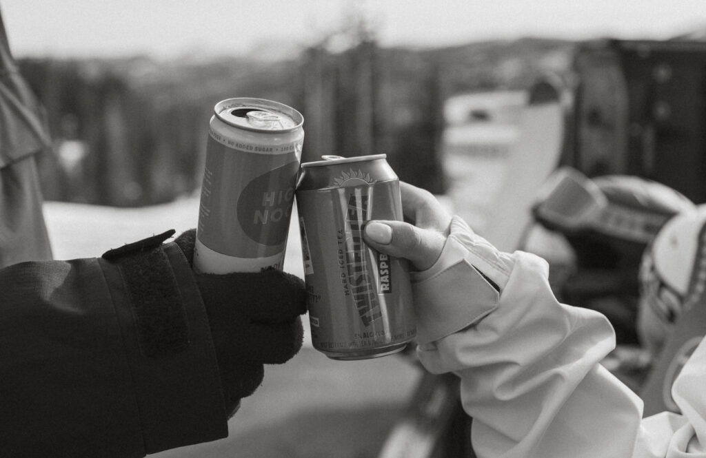 Bride and Groom sharing a drink on their elopement day