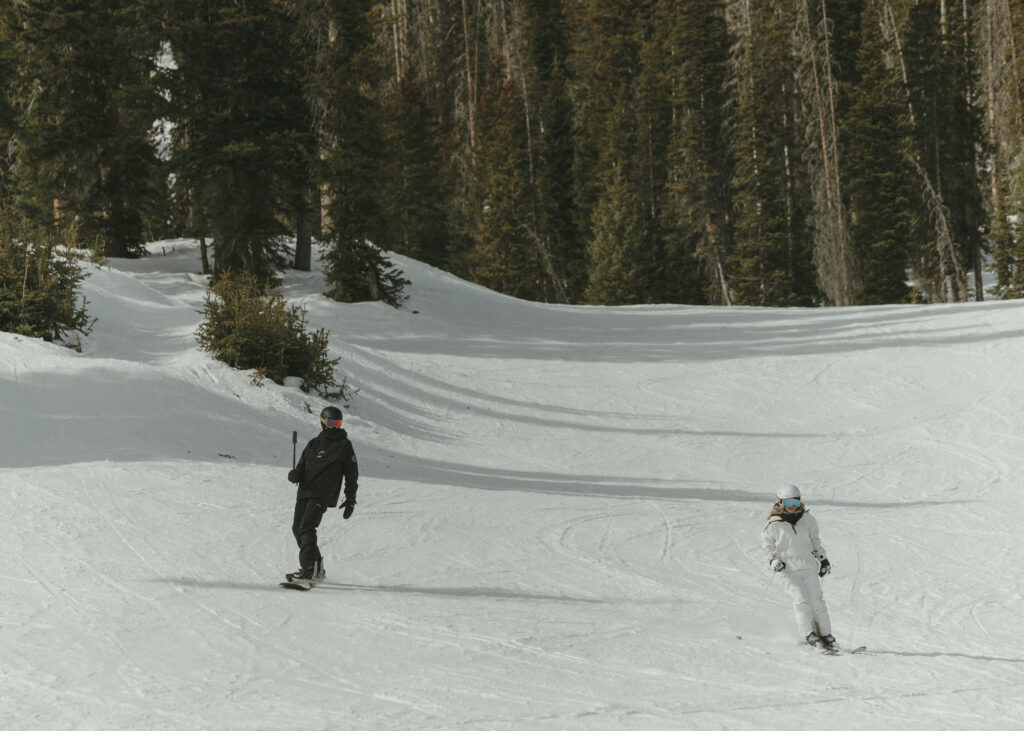 Bride and Groom making their last ski run of the day at Wolf Creek Ski Area 