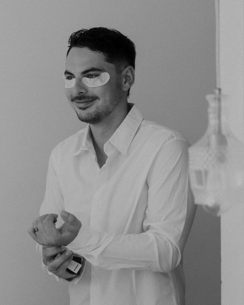 groom getting ready relaxed morning candid destination wedding Mexico groom prep details