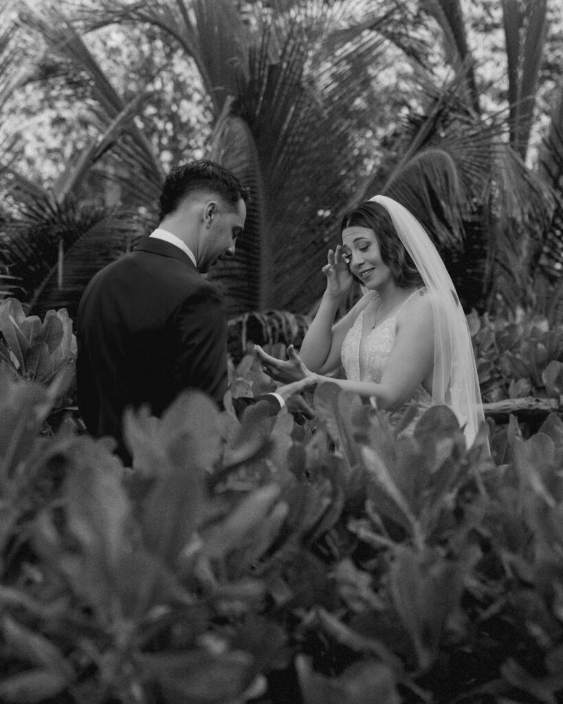 emotional bride and groom exchanging vows intimate tropical garden destination wedding Mexico