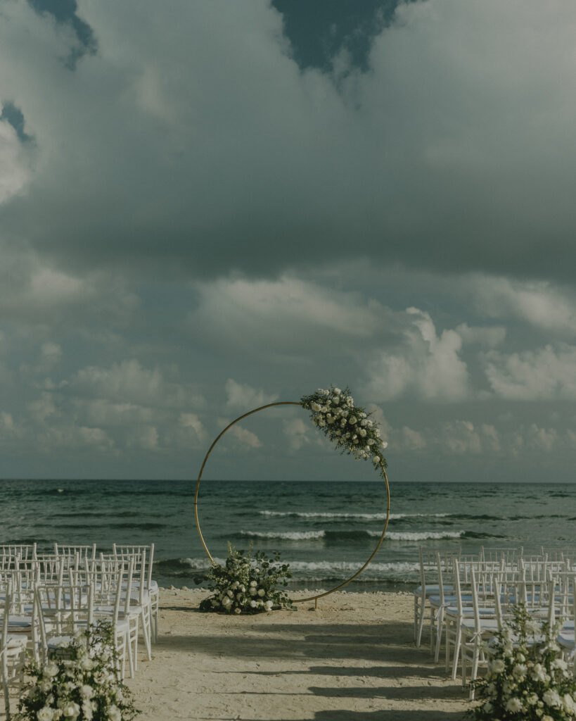 beach wedding ceremony setup Cancun Mexico oceanfront destination wedding