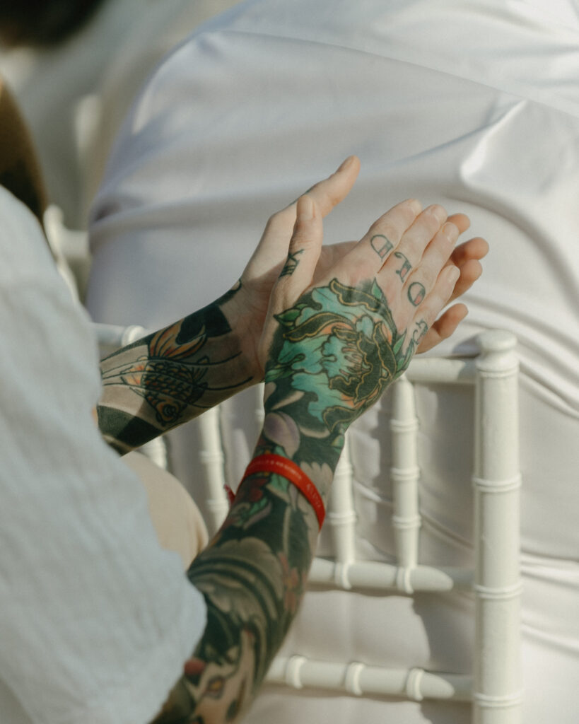 wedding guest clapping hands detail candid celebration destination wedding Mexico