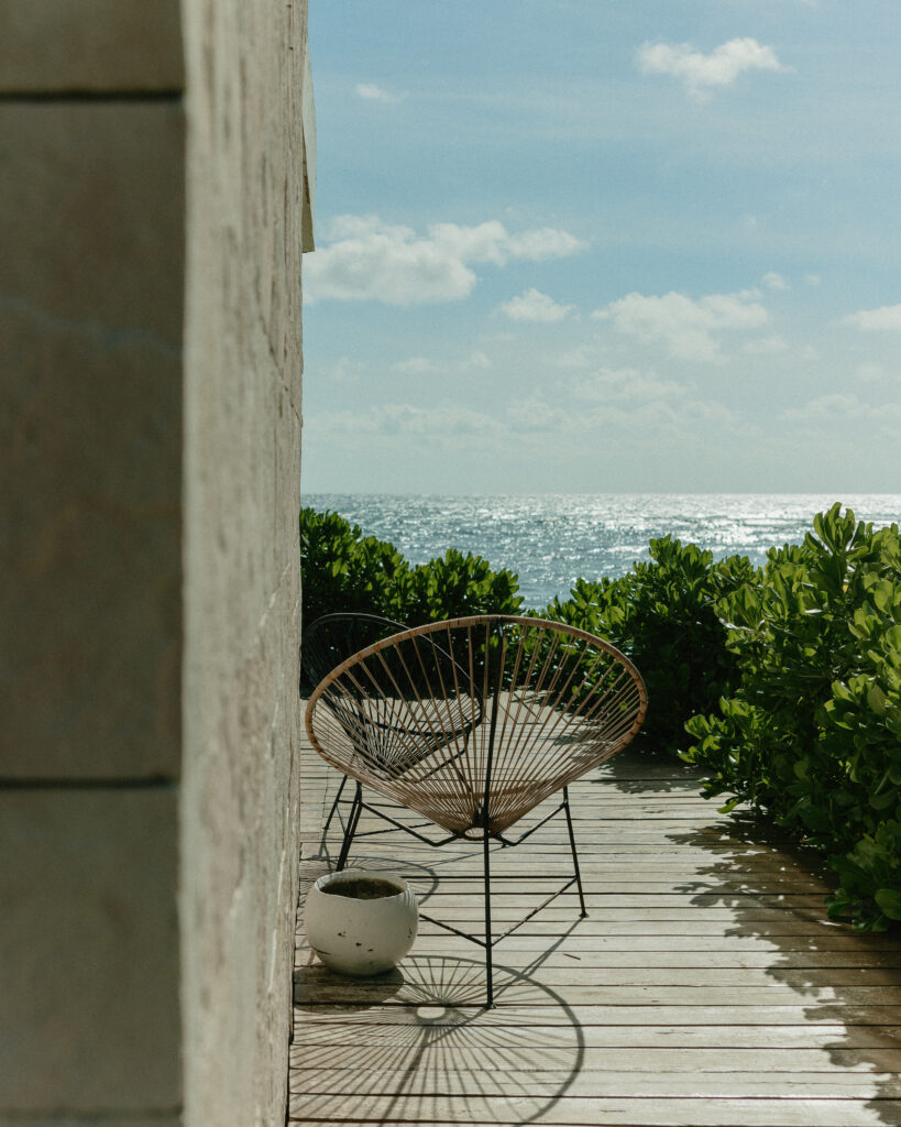 oceanfront patio chair view Cancun Mexico wedding villa