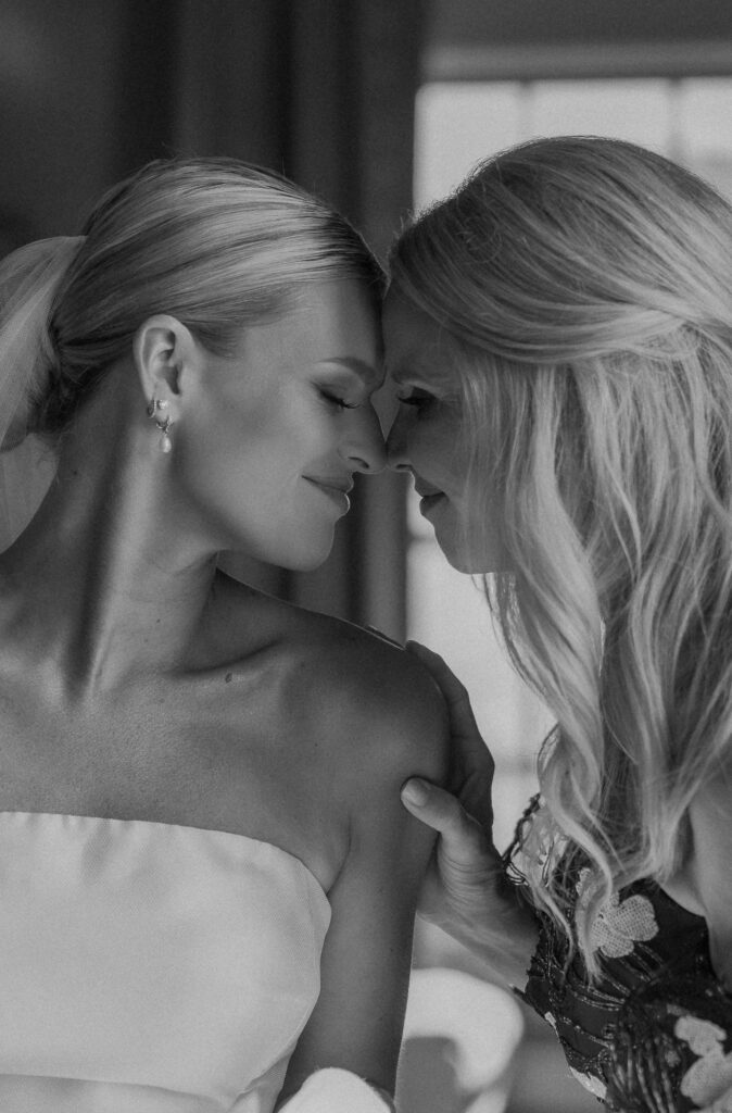 Bride sharing emotional moment with mom before ceremony at Trinity View Farm wedding