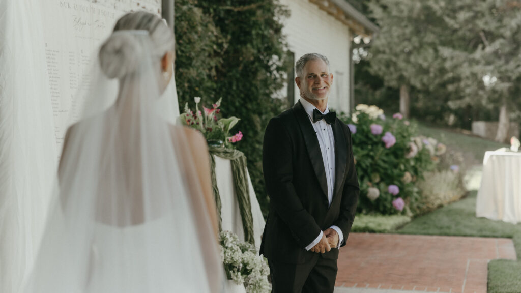 Father of the bride reacting during first look moment at Trinity View Farm wedding in Franklin TN