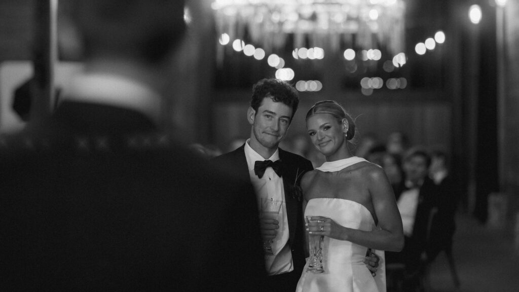 Bride and groom holding drinks during wedding reception at Trinity View Farm in Franklin Tennessee
