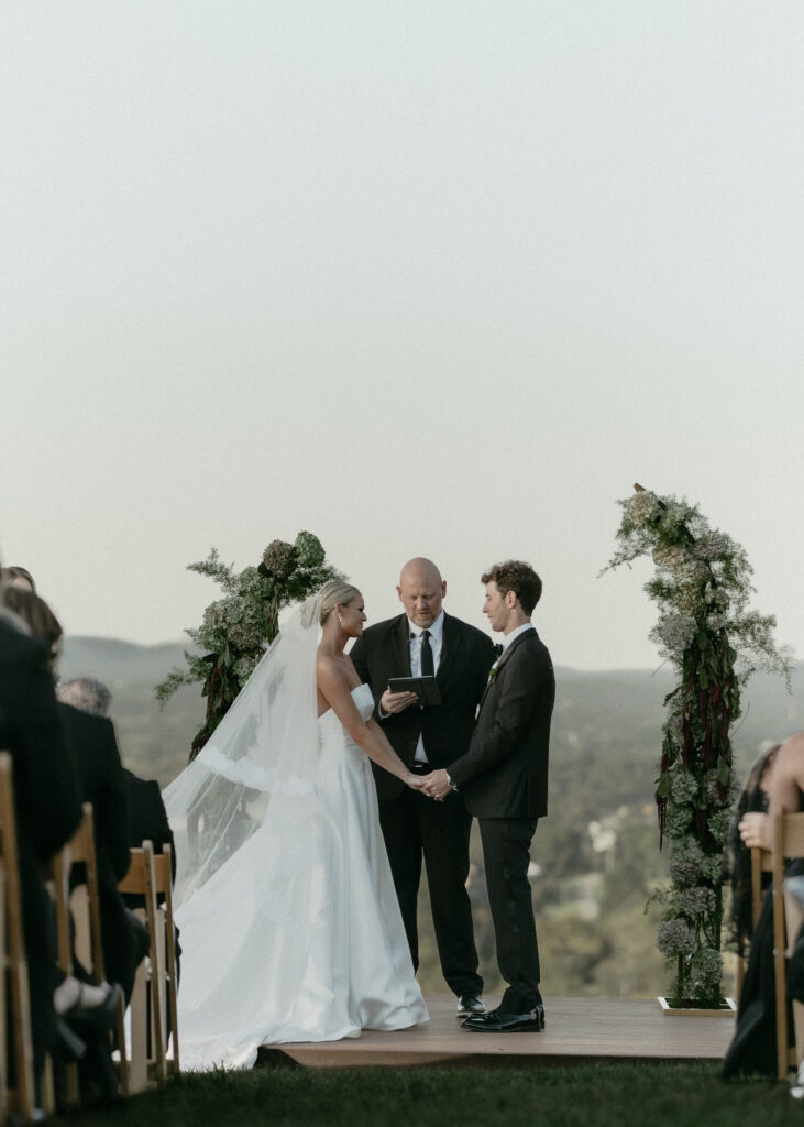 Bride and groom exchanging vows during outdoor ceremony in Franklin Tennessee