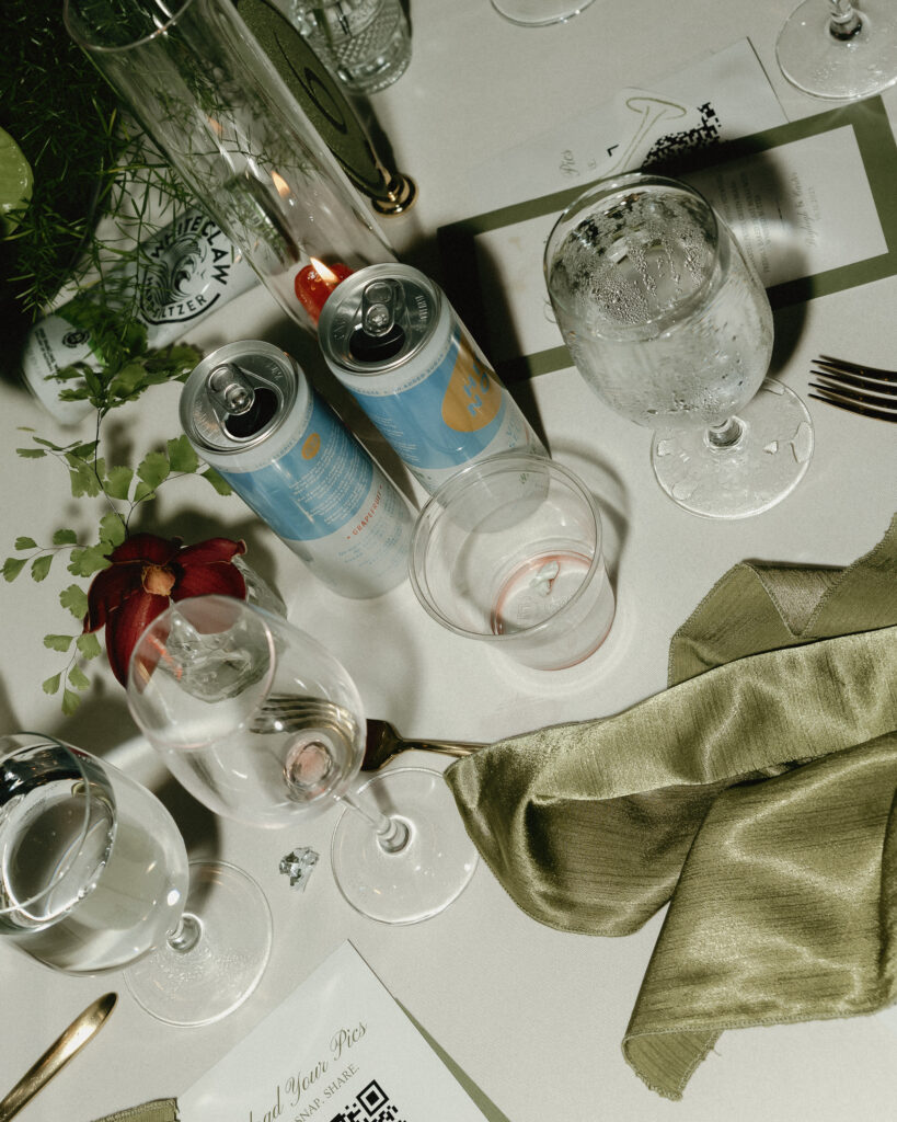 Wedding reception table details with champagne glasses and decor at Trinity View Farm in Franklin Tennessee