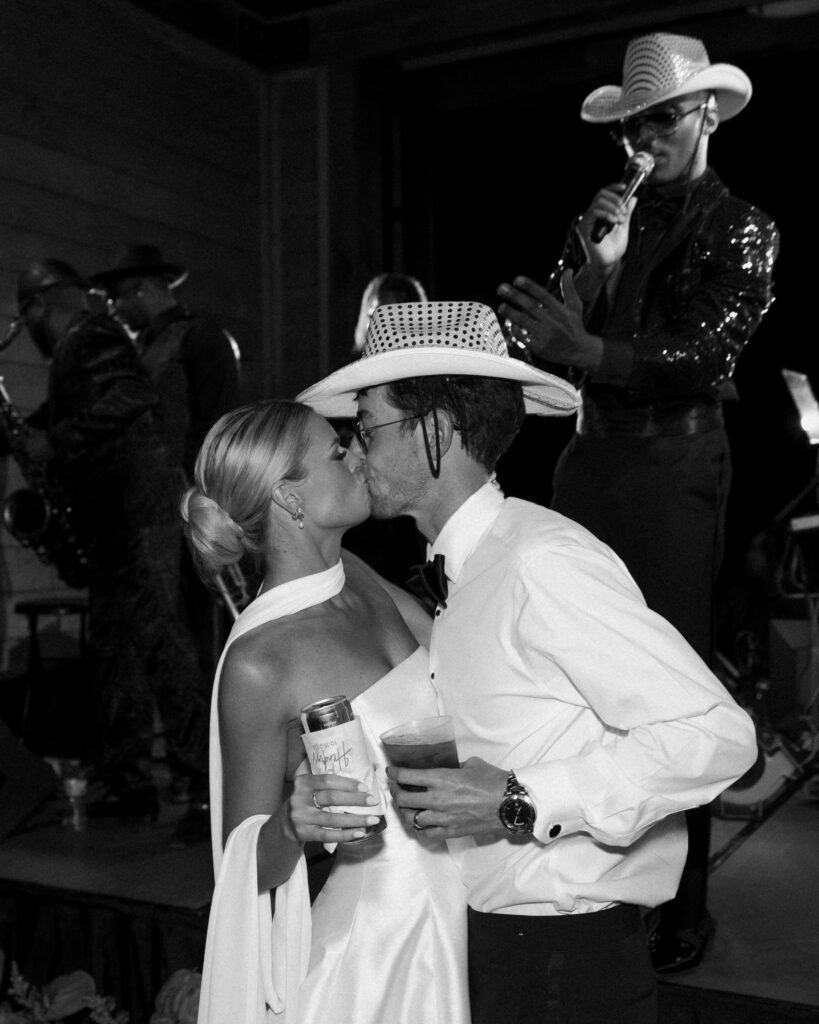 Bride and groom kissing on dance floor during reception at Trinity View Farm wedding