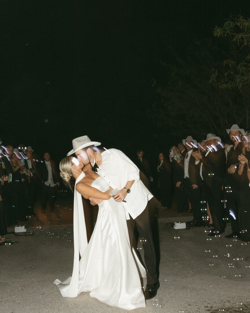 Guests dancing with motion blur lights during high energy wedding reception in Franklin TN