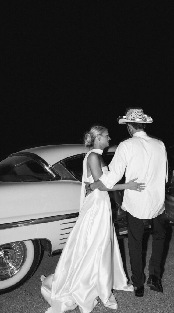 Bride and groom walking toward getaway car during wedding exit in Franklin TN
