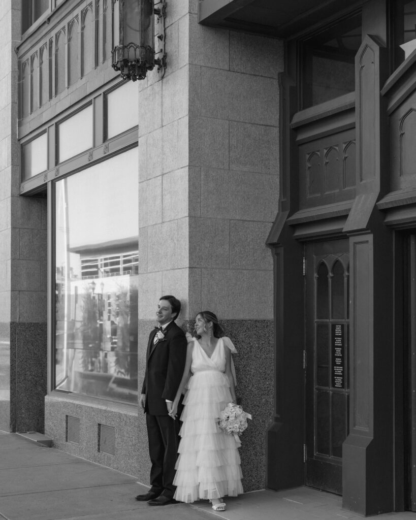 bride groom standing outside chapel amarillo texas wedding portraits